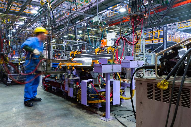 Man working on assembly line 